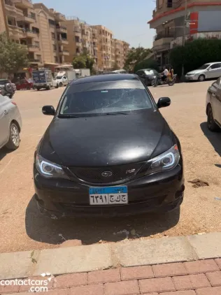 سوبارو امبريزا 2010 أبيض مستعملة للبيع